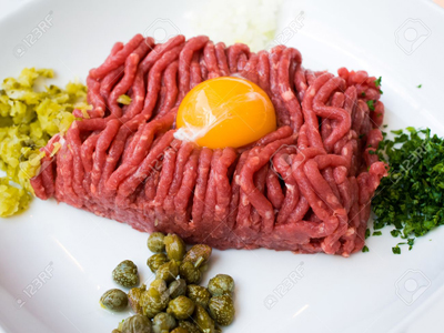 Steak Tartare, i.e. raw meat, is sometimes served like this. Seemed a suitable meal for a tyrannosaurus.