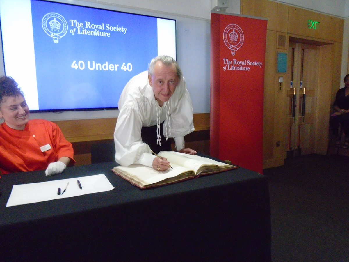 Bryan signing the roll at the Royal Society of Literature, using Lord Byron's pen!