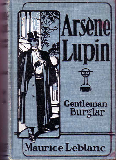 Shish is reading a book about Arsène Lupin, a fictional gentleman thief and hero of many prose stories written by Maurie Leblanc (1864 -1941) and others. There have been films, stage shows and comics, including manga, based on him. Leblanc is often described as the French equivalent to Sir Arthur Conan Doyle.